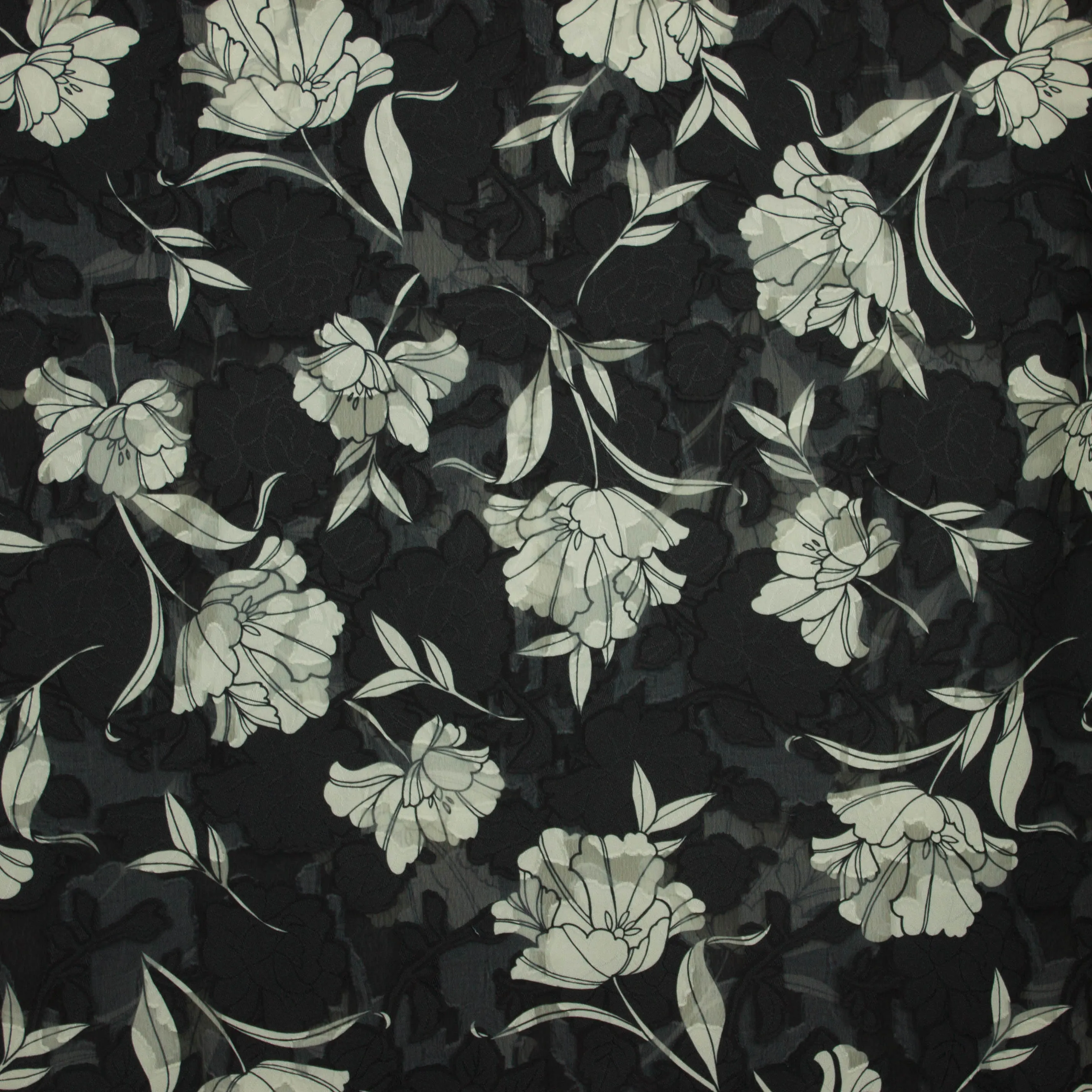 Voile zwart jacquard met witte bloemen